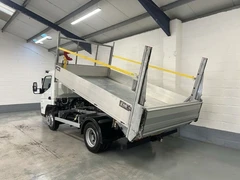 2023 Fuso Canter Tipper Van — rear three-quarter view