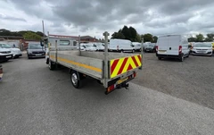 2023 Isuzu Grafter Dropside Van — rear three-quarter view