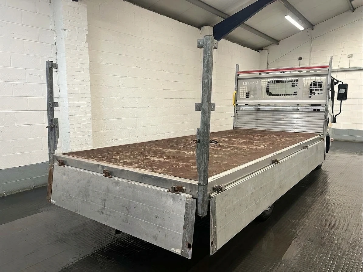 2023 Isuzu Grafter Dropside Van — rear three-quarter view