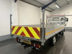 2023 Isuzu Grafter Dropside Van — rear three-quarter view