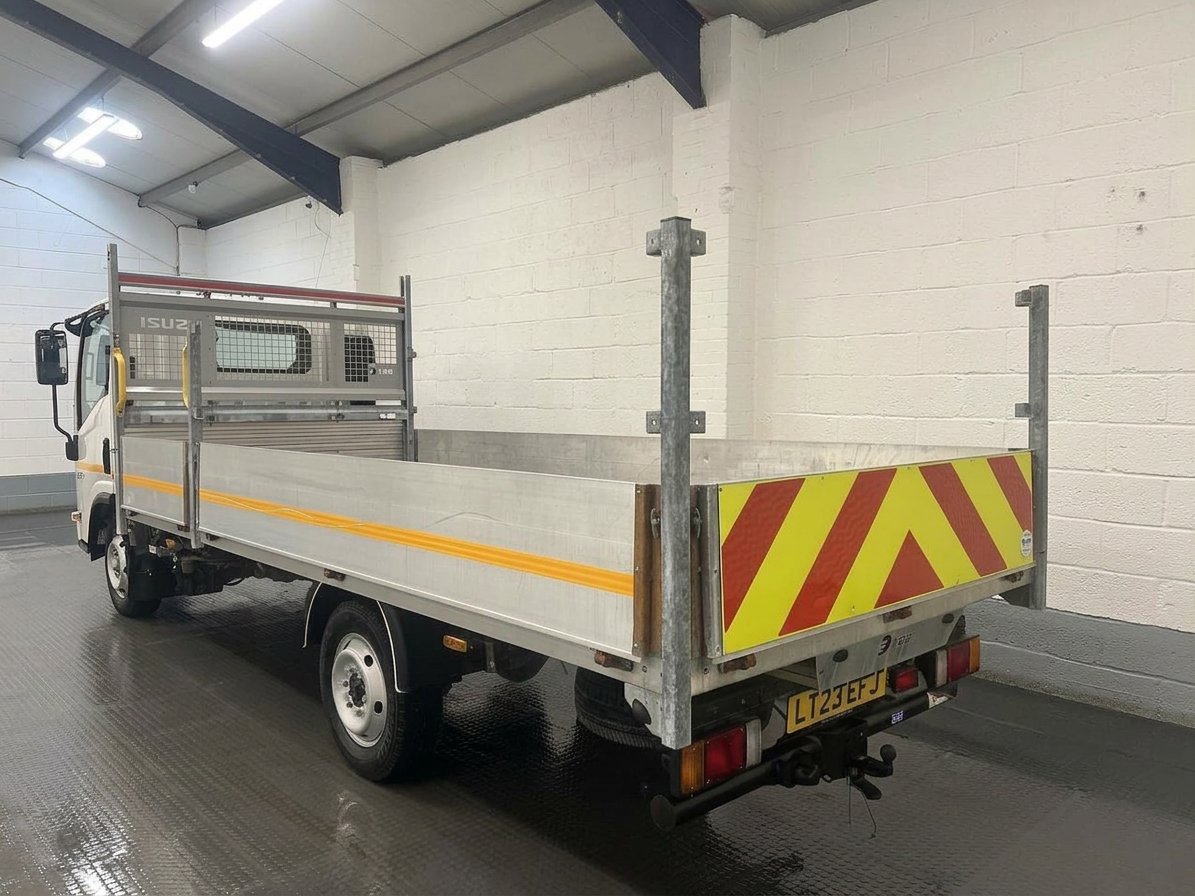 2023 Isuzu Grafter Dropside Van — rear three-quarter view