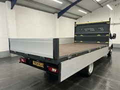 2024 Ford Transit Dropside Van — rear three-quarter view
