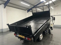 2023 Isuzu Grafter Tipper Van — rear three-quarter view