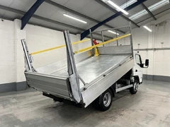 2023 Fuso Canter Tipper Van — rear three-quarter view