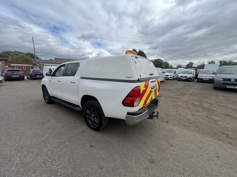 2023 Toyota Hilux Double Cab PickUp Van — rear three-quarter view
