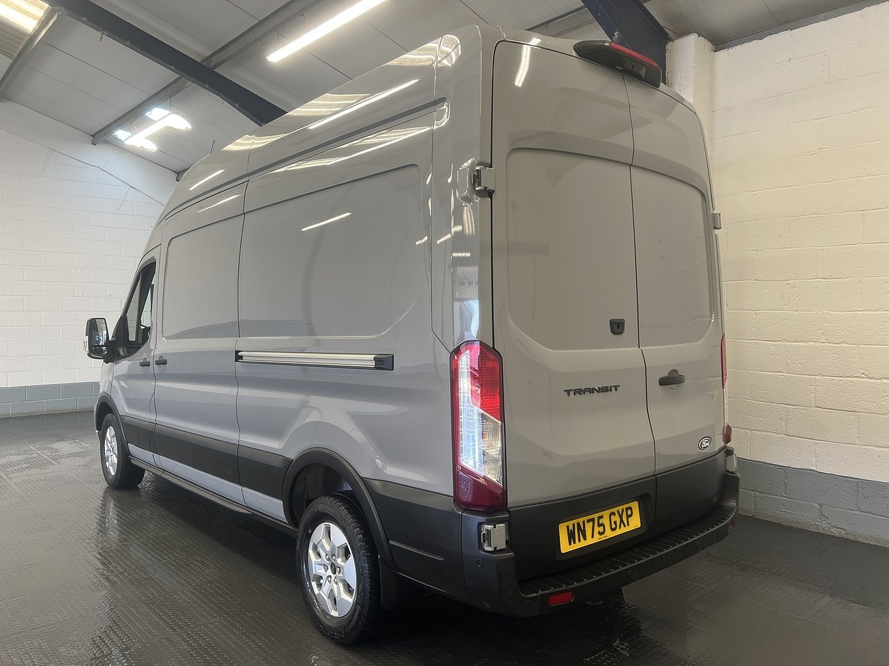 2025 Ford Transit High Roof Panel Van — rear three-quarter view