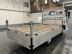 2023 Isuzu Grafter Dropside Van — rear three-quarter view