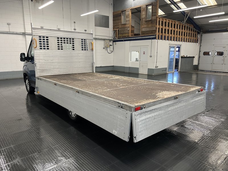 2023 Maxus Deliver 9 Dropside Van — rear three-quarter view