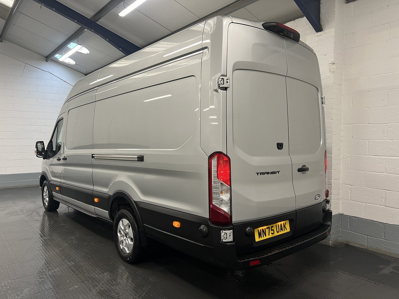 2025 Ford Transit High Roof Panel Van — rear three-quarter view