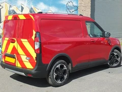 2025 Ford Transit Courier Panel Van — rear three-quarter view