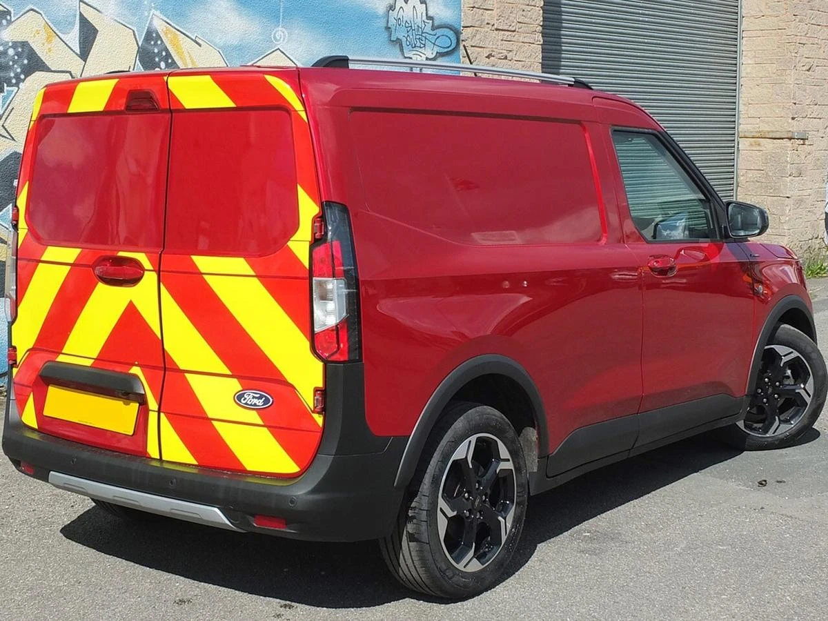 2025 Ford Transit Courier Panel Van — rear three-quarter view