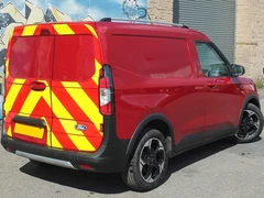 2025 Ford Transit Courier Panel Van — rear three-quarter view