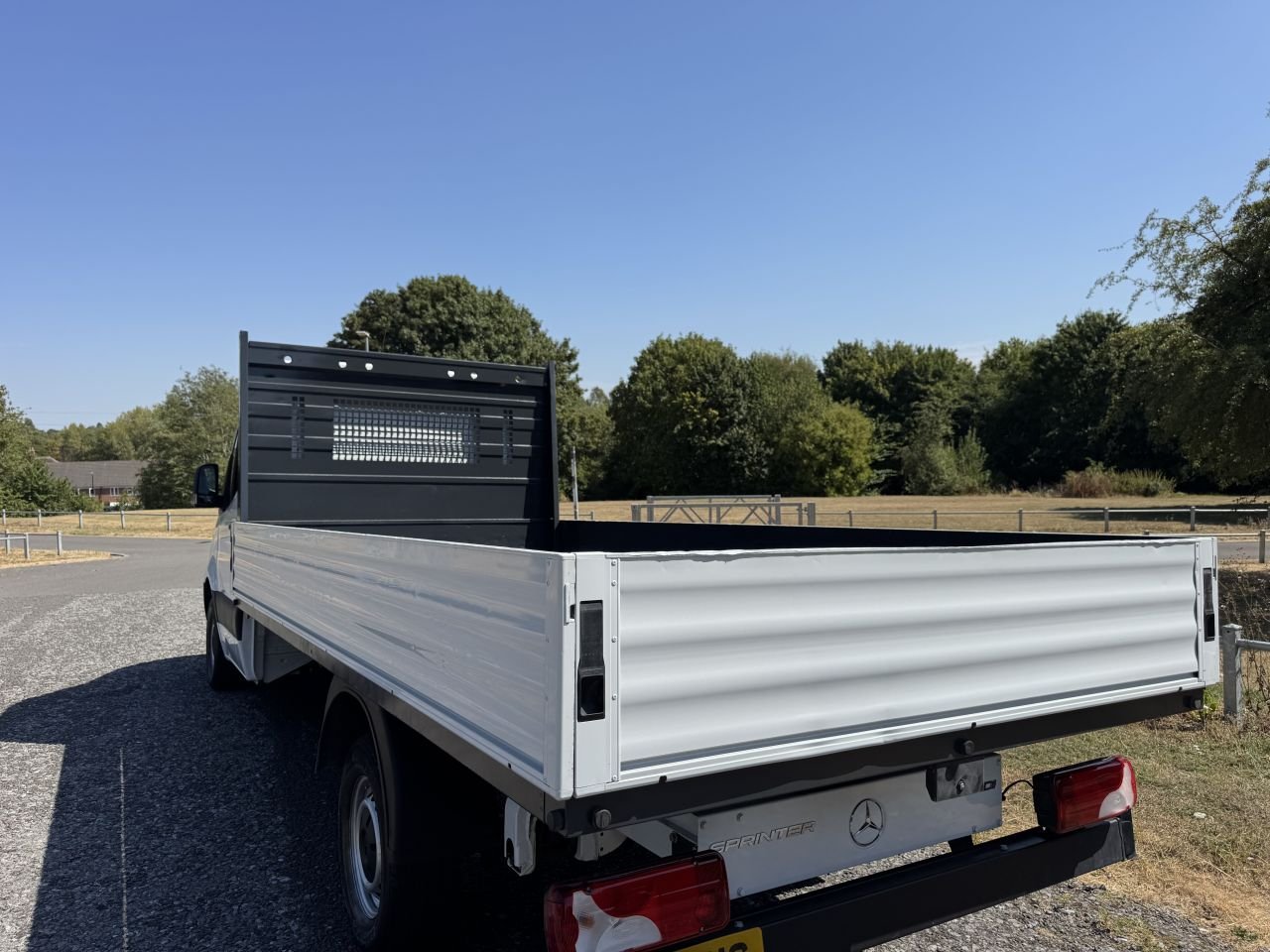 2025 Mercedes-Benz Sprinter Dropside Van — rear three-quarter view