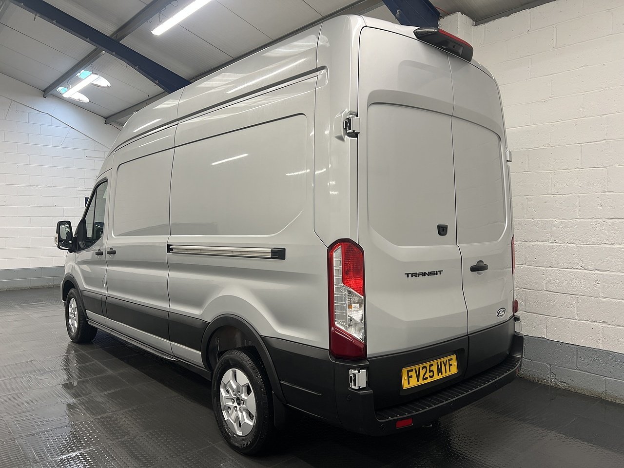 2025 Ford Transit High Roof Panel Van — rear three-quarter view