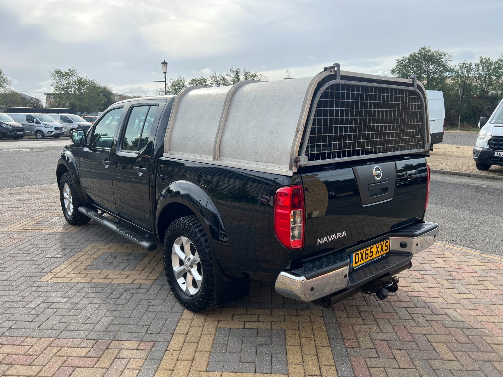 2015 Nissan Navara Double Cab PickUp Van — rear three-quarter view