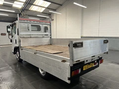 2023 Isuzu Grafter Dropside Van — rear three-quarter view